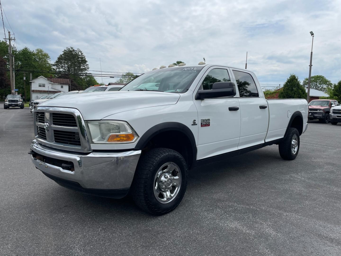 2012 White Dodge Ram 2500 ST Crew Cab LWB 4WD (3C6UD5HL2CG) with an 6.7L L6 OHV 24V TURBO DIESEL engine, 6-Speed Automatic transmission, located at 101 N. Main Street, Muncy, PA, 17756, (570) 546-5462, 41.207691, -76.785942 - Photo#0